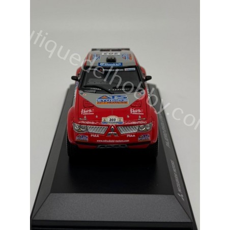 MITSUBISHI PAJERO EVOLUTION S. PETERHANSEL DAKAR 2004 NOREV ESCALA 1:43